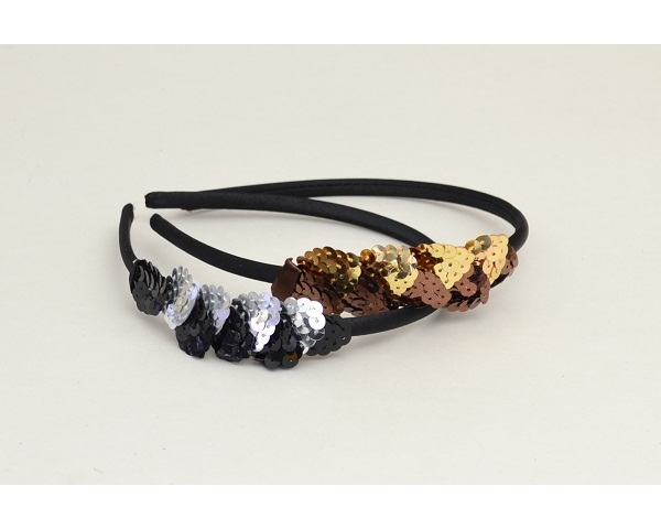 Sateen alice band with side sequin design. In black & brown