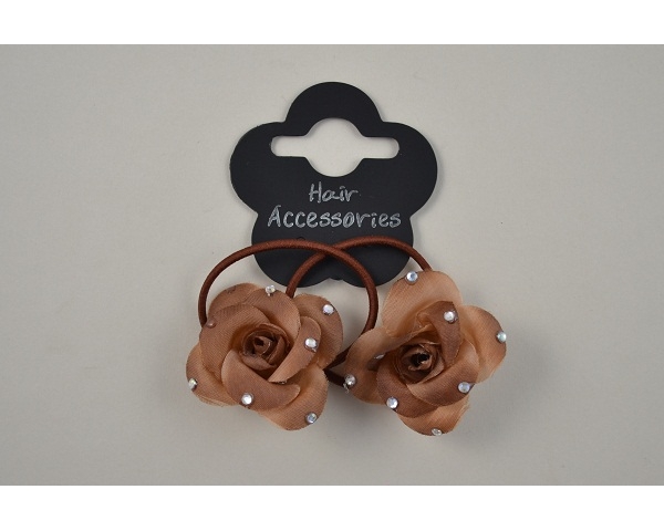 2 small roses on elastics with diamante detail per card. Packed 4x cream/beige/brown