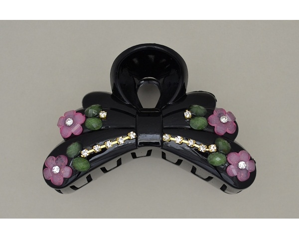 Glossy black clamp with pink flower bead, green beads & diamantes. Approx 8.5cm