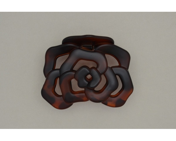 Flower shaped clamp. Packed in glossy & matt finish in torte, brown & black. Approx 7cm