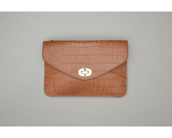 Clutch style bag with rose gold fastening. Additional longer strap included. 29x20 (LxH)