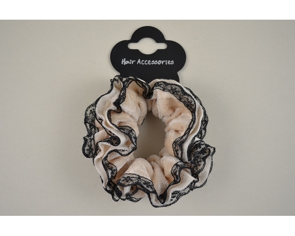Single scrunchie per card in tones of brown. Packed assorted design as per images