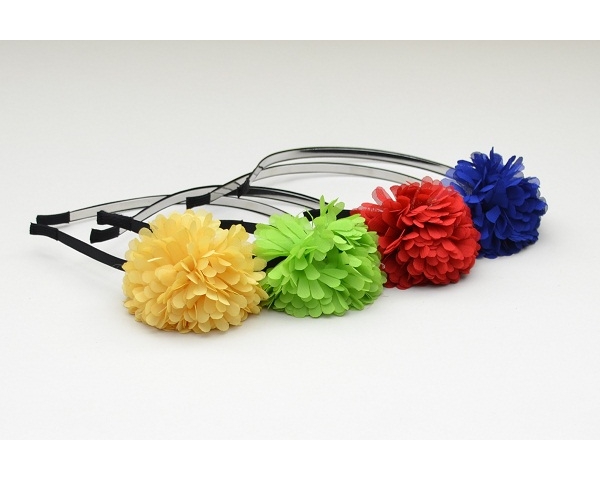 Covered metal alice band with chiffon pom pom flower in bright neon colours as shown
