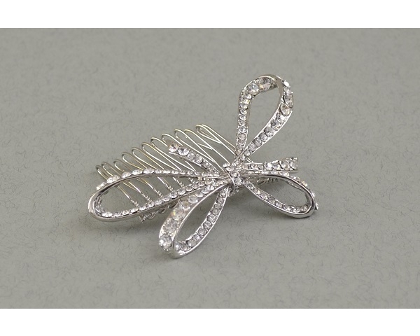 Ribbon bow shaped hair comb decorated with crystals. Approx 8cm