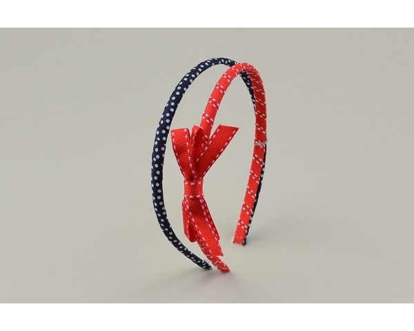 2 alice bands per card, one plain one with bow. In red and blue as per images