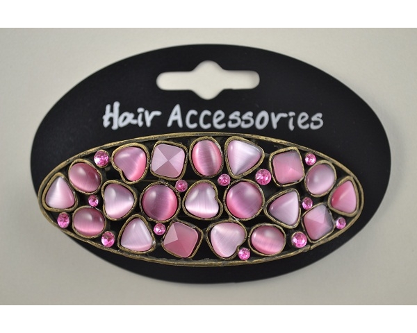 Oval shaped barrette with stone insert detail. Pink and grey