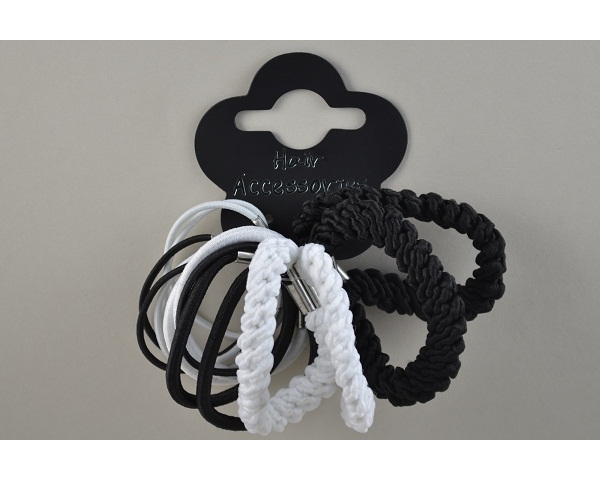 14 elastics of varying thickness in black and white.