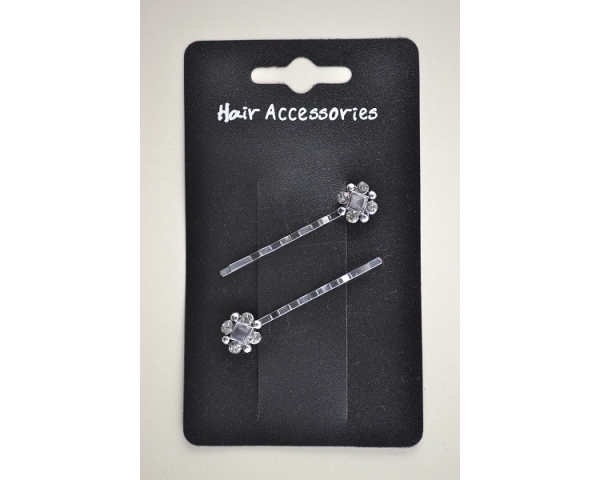 2 silver grips with diamante detail. In clear stone