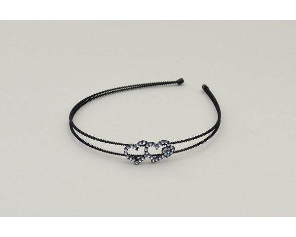 Black metal double alice band with diamante heart detail.