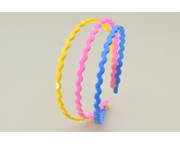 3 wavy design alice bands per card. In pink, yellow & blue & purple, yellow & pink