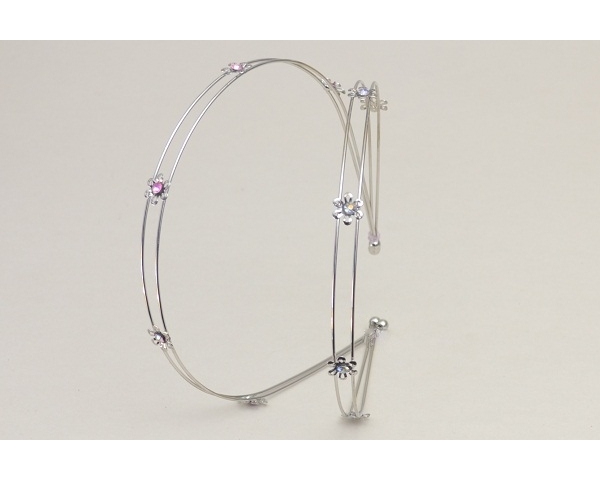 Double metal alice band with flower and diamante. In clear & pink