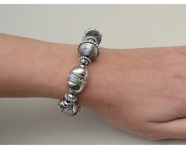 Silver elasticated large charms bracelet