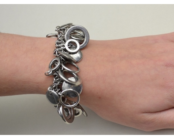 silver elasticated hoop and circle charm bracelet