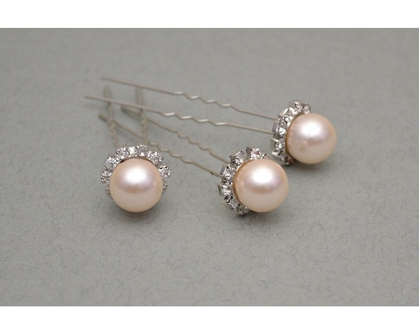 Large pearl bead hair pin outlined with 10 crystals. Packed 6 pins per container.
