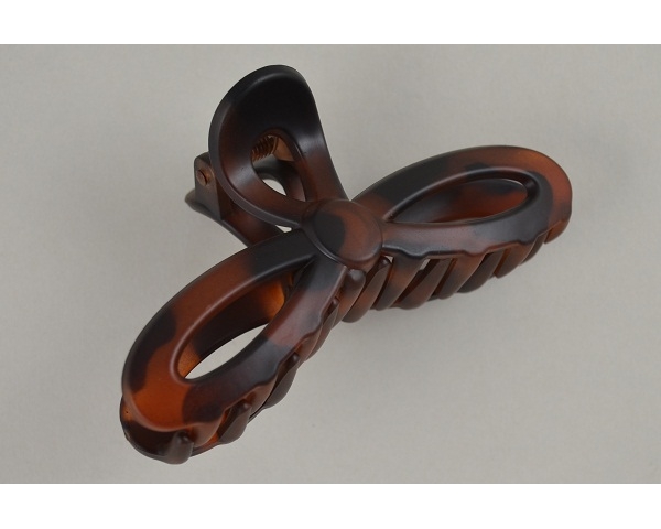 Bow shaped clamp in a matt & glossy finish. Packed assorted colours as per images.