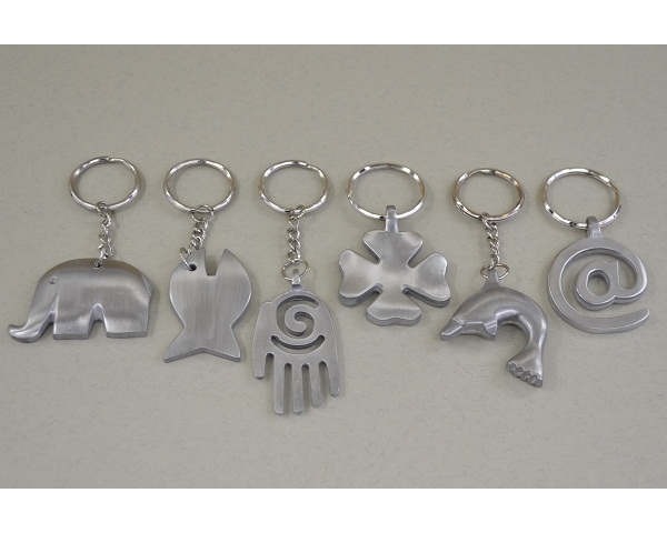 Silver keyring. 6 designs as per images. Assorted designs per pack