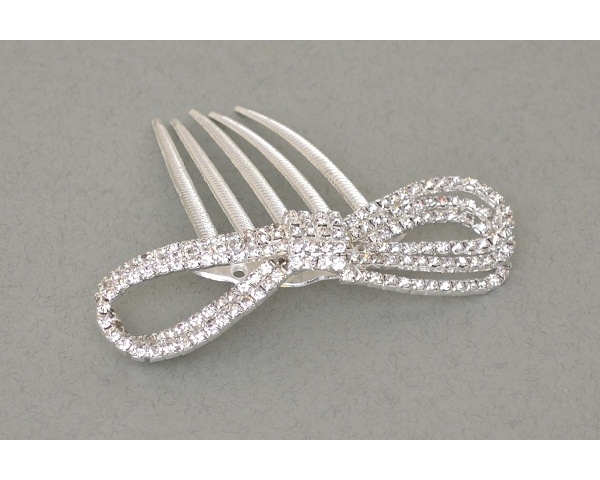 Bow shaped miniature comb decorated with crystals.L = 10cm approx