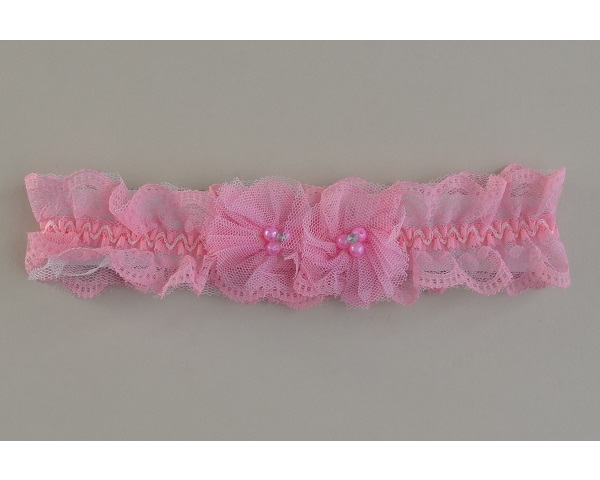 Girls lacy netted elasticated kylie with net and bead design in pink. Length approx 20cm. Width approx 5cm