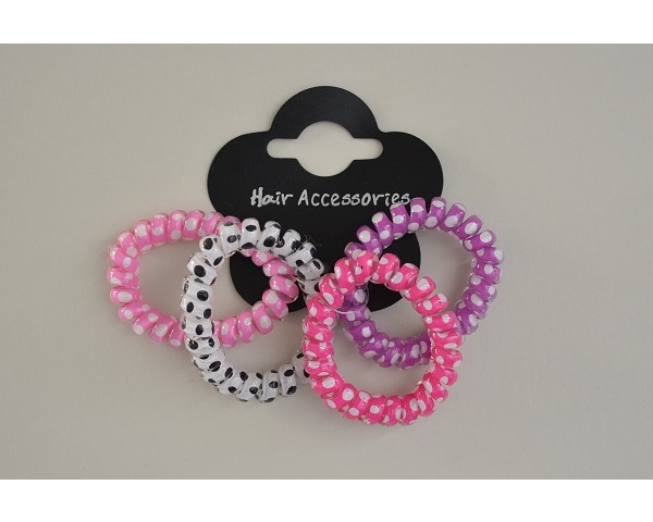 Polka dot print coil ponytail holders. 4 per card. Colours as shown