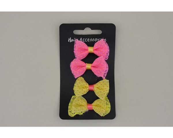 Mini bow beak clip in spotty design. 4 per card. Colours as per images per pack