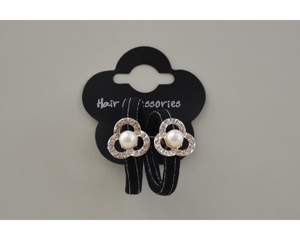 Large black ponio with silver coloured thread decorated with diamante and pearl  bead shapes as per images.