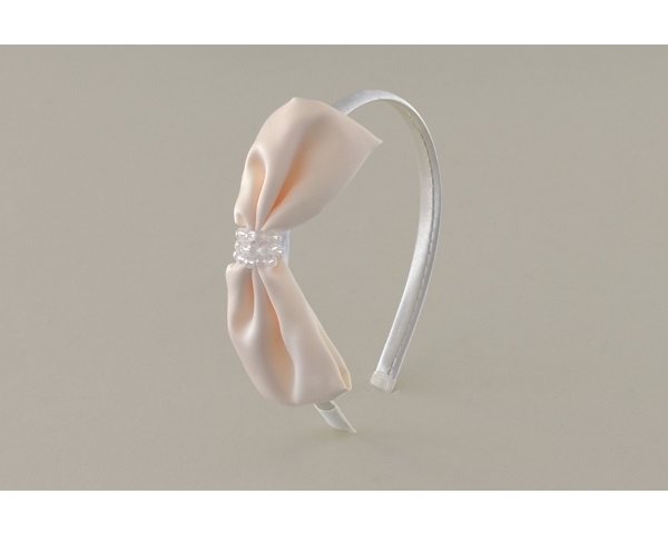 sateen covered alice band with side mounted bow and clear bead finish. In shades of pink and a cream