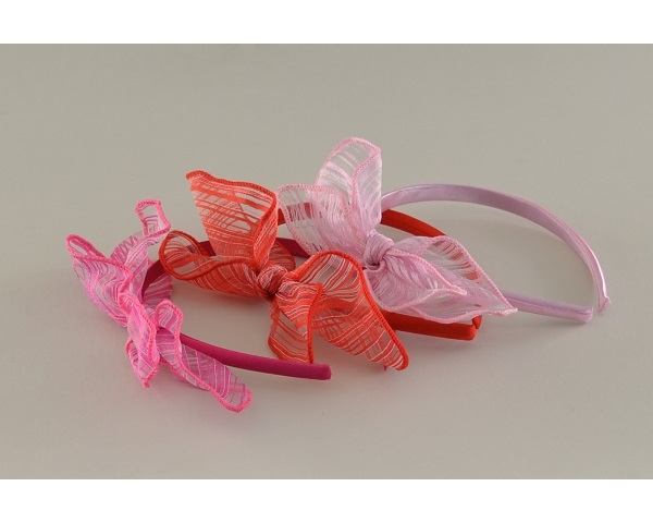 Sateen covered alice band with side mounted candy stripe chiffon bow. Colours as per images